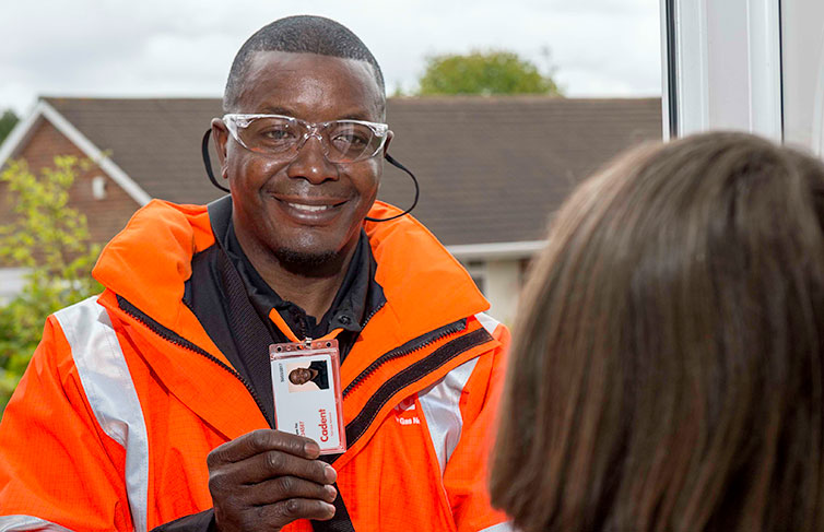 Cadent engineer showing his id to customer