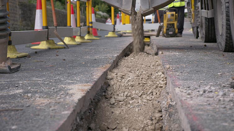 Truck with grey material filling the hole