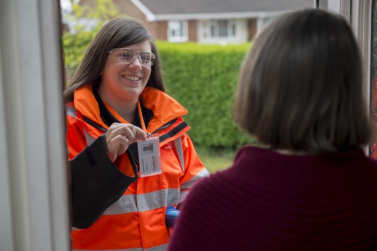 female-engineer standing at door